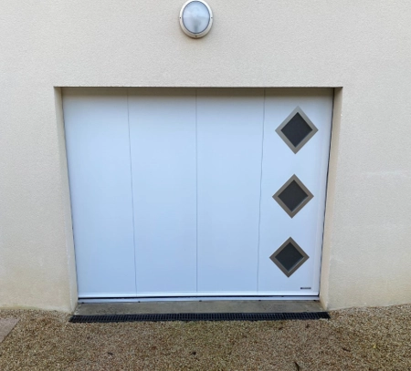 Quels sont les avantages de la porte de garage sectionnelles ? - Quelles sont les caractéristiques de la porte de garage...