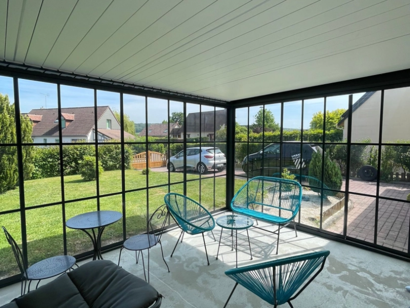 Création d’une pergola aux portes coulissantes en Normandie