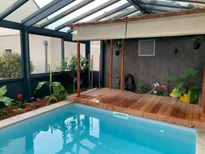 Couverture d'une piscine par une véranda aluminium à Caen