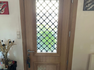 Installation d'une porte Bel'M en bois à Honfleur