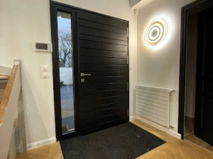 Installation d'une porte en bois à Caen