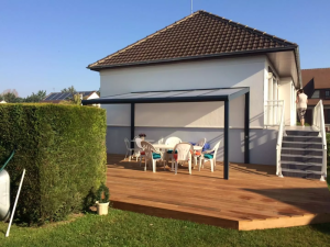 Création d’une pergola avec agrandissement une terrasse en bois dans la manche